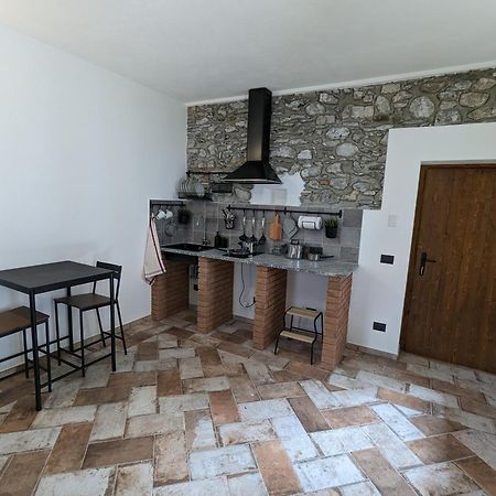 Antica Osteria Apartments دونغو الغرفة الصورة