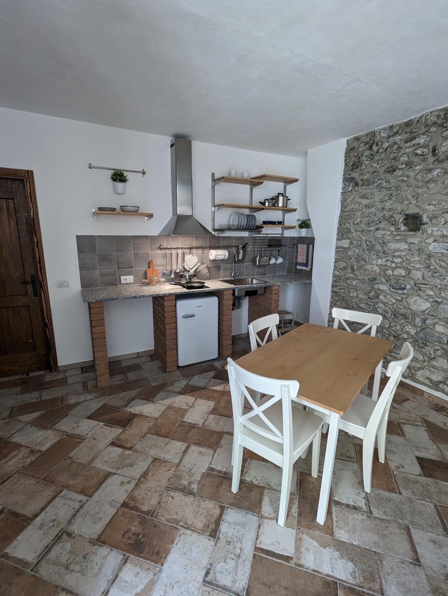 Antica Osteria Apartments دونغو الغرفة الصورة